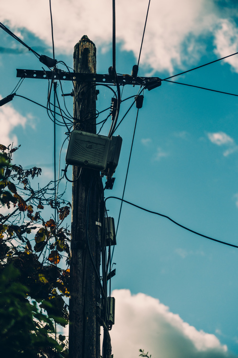 Electric pole with transformation box
