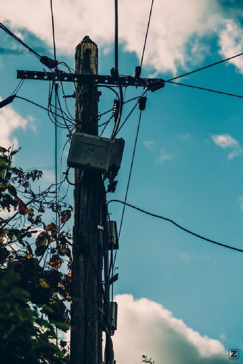 Electric pole with transformation box