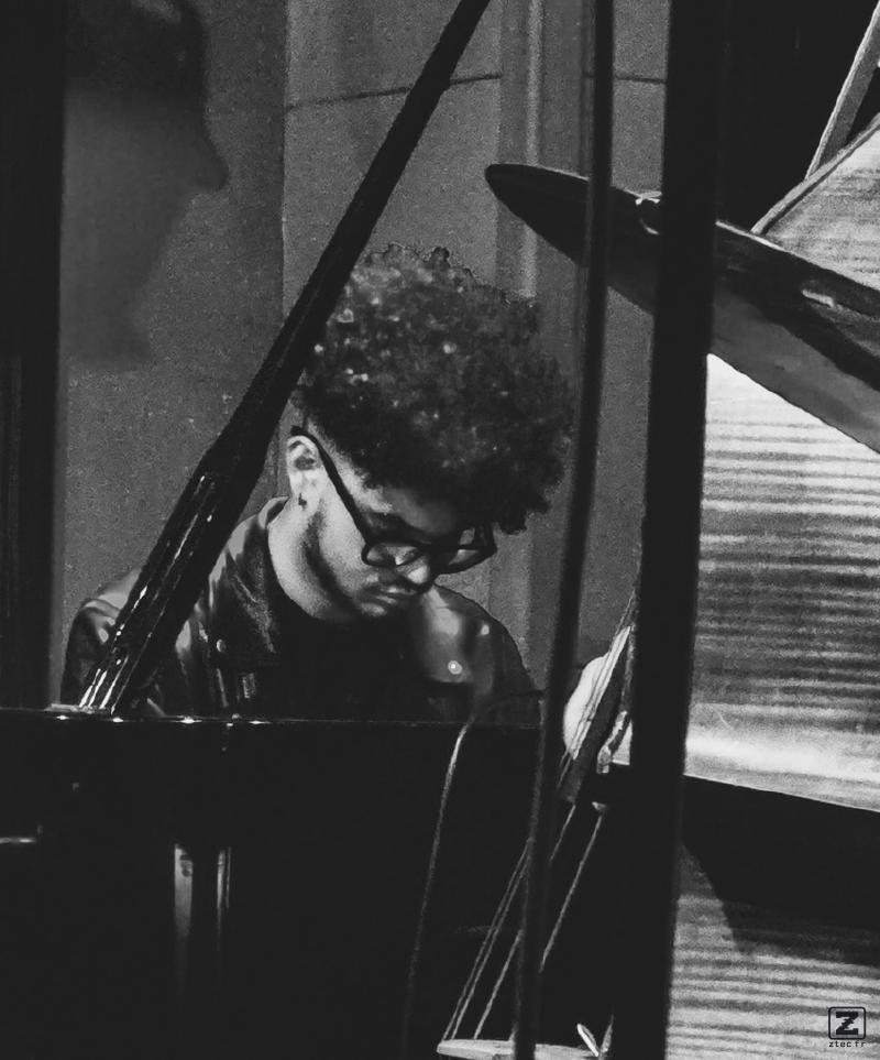 Tyler Bullock II playing Piano at Theo Croker concert