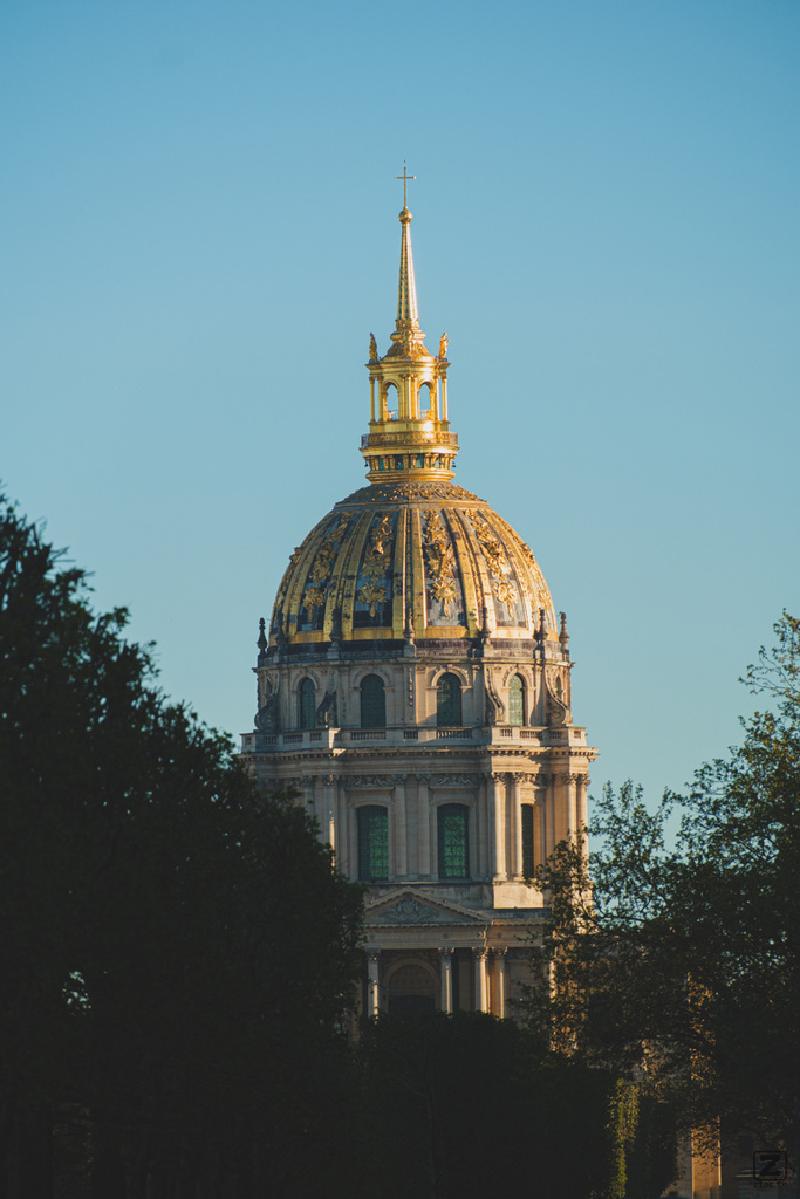 The Invalid gold capitol in Paris with a blue sky