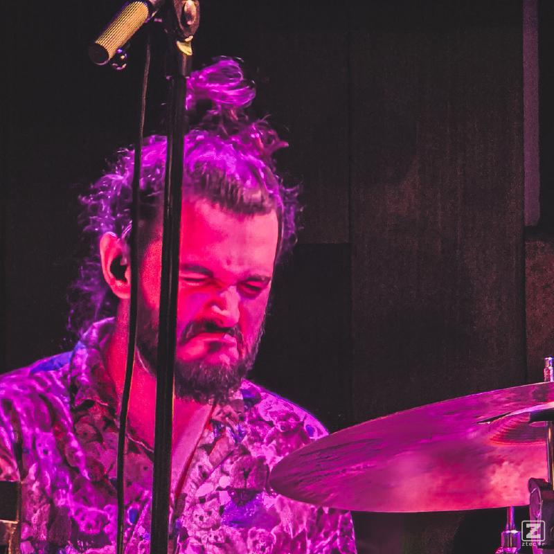 Drummer heavily concentrated in drumming