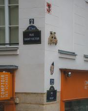 3D Space invader street art mosaic on the wall.