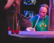 Mackwood playing drums