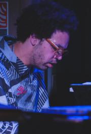 Tony Tixier playing piano