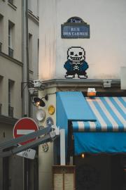 Street art mosaic of a skeleton from Undertale