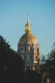 The Invalid gold capitol in Paris with a blue sky
