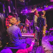 Old School Funky Family on stage in pyjama