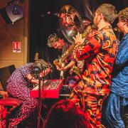 The whole band (almost) around the keyboard player