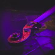 A closeup of the tip of the Eric Wheeler's double bass 
