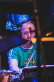 Mackwood playing drums at Duc des Lombards