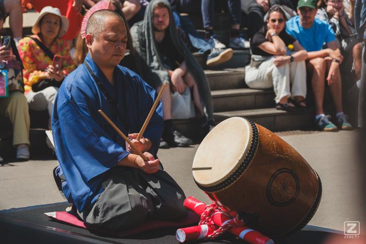 The drummer playing Yagura-daiko to indicate the start of the Sumo battle