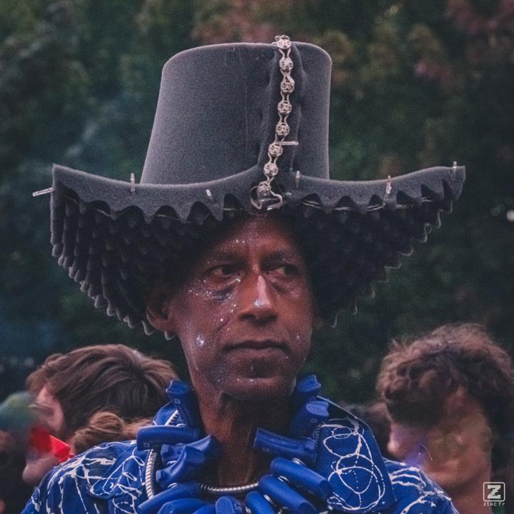 A man with a Hat made of sound dampening materials