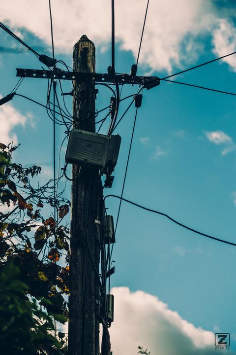 Electric pole with transformation box