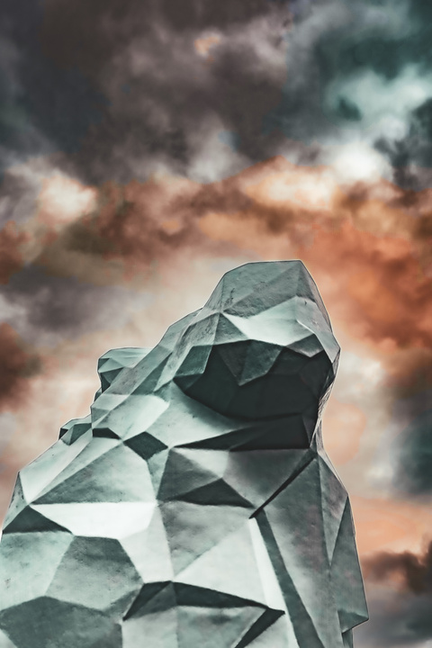 Dramatic clouds and a styled Lion head from behind.
https://www.flickr.com/photos/ztec/53394489578/