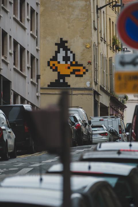 Street art mosaic of Daffy duck