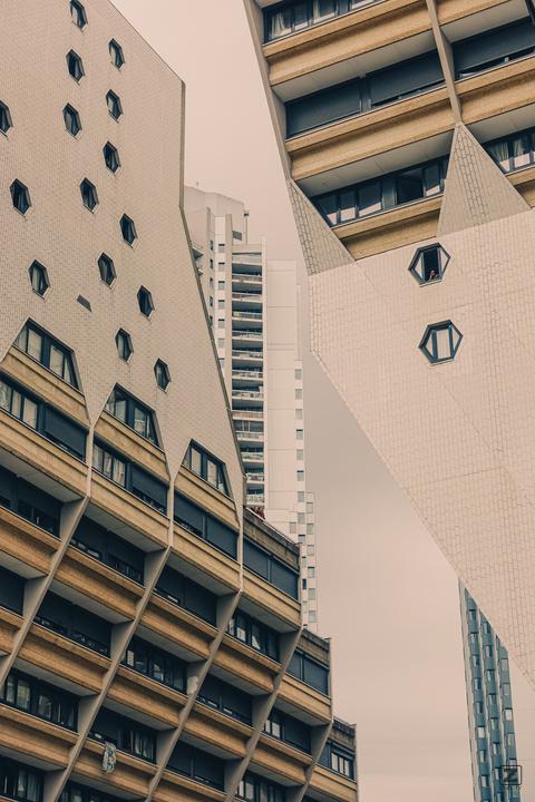 Multiple futuristic buildings in Paris.  
https://www.flickr.com/photos/ztec/53826107951/
Albums: www, Paris