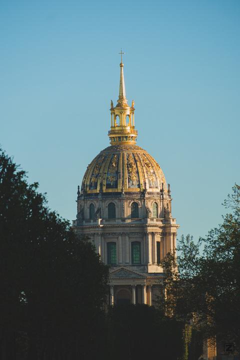 The Invalid gold capitol in Paris with a blue sky