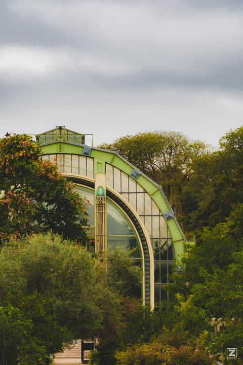 Jardin-des-plantes main greenhouse in the middle of trees