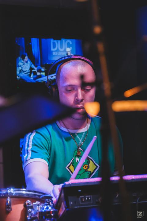 Mackwood playing drums at Duc des Lombards