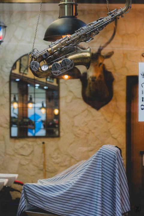A saxophone as decoration in a Barber shop