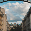 Typical parisians building with some elements from the Beaubourg museum over the roof of the center building. 