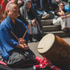 The drummer playing Yagura-daiko to indicate the start of the Sumo battle