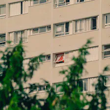 A red window among white windows
https://www.flickr.com/photos/ztec/54726364119/