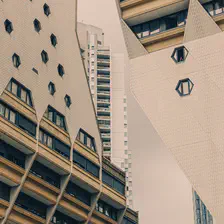 Multiple futuristic buildings in Paris.  
https://www.flickr.com/photos/ztec/53826107951/
Albums: www, Paris