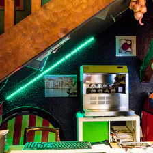 No HDR envolve here. Just a simple shot. Some levels are change to enhance the green around the neon, that's all :-) 
https://www.flickr.com/photos/ztec/9192388889/