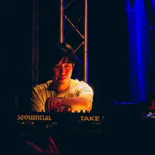 Takahiro Izumikawa playing with knobs of his keyboard