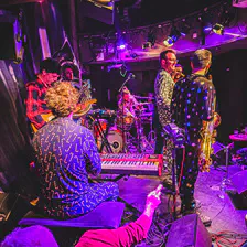 Old School Funky Family on stage in pyjama